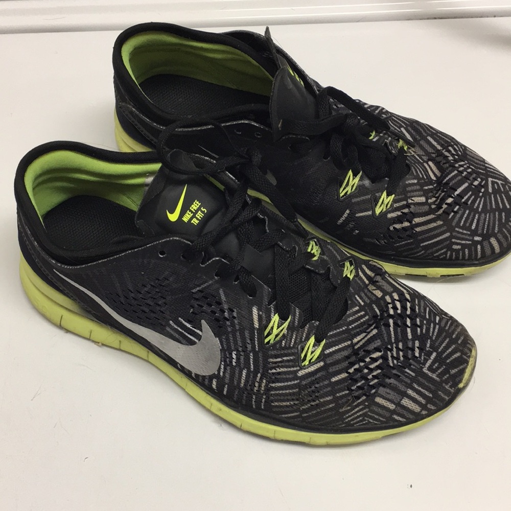 Black and yellow Nike sneakers